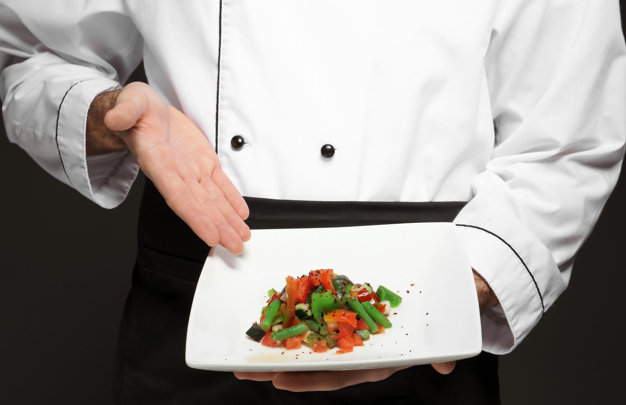 Chef demonstrating a plated dish